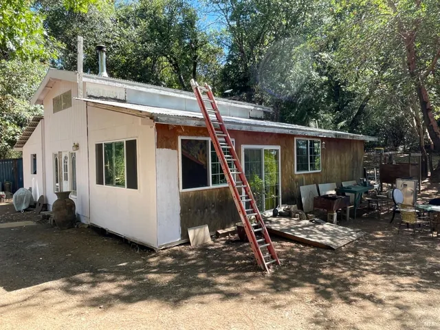 a view of a house with a patio
