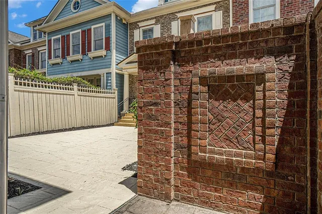 a bathroom with a shower and a sink