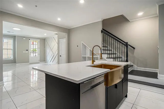 a room with a table chairs and wooden floor