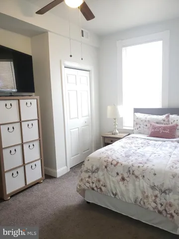 a view of living room with flat screen tv and piano