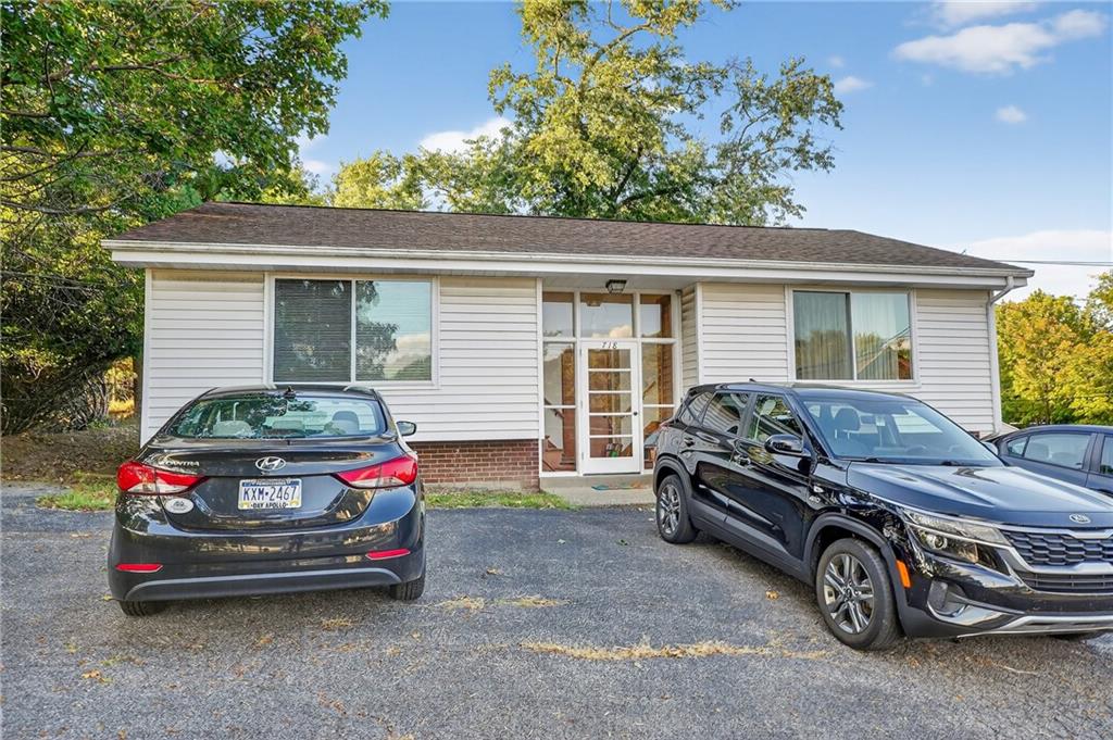 718 West Ingomar Road Pittsburgh, PA 15237 - Photo 13 of 40 a car parked in front of a house