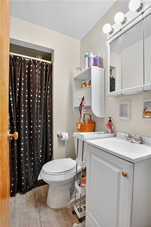 718 West Ingomar Road Pittsburgh, PA 15237 - Photo 17 of 40 a bathroom with a sink toilet vanity and shower