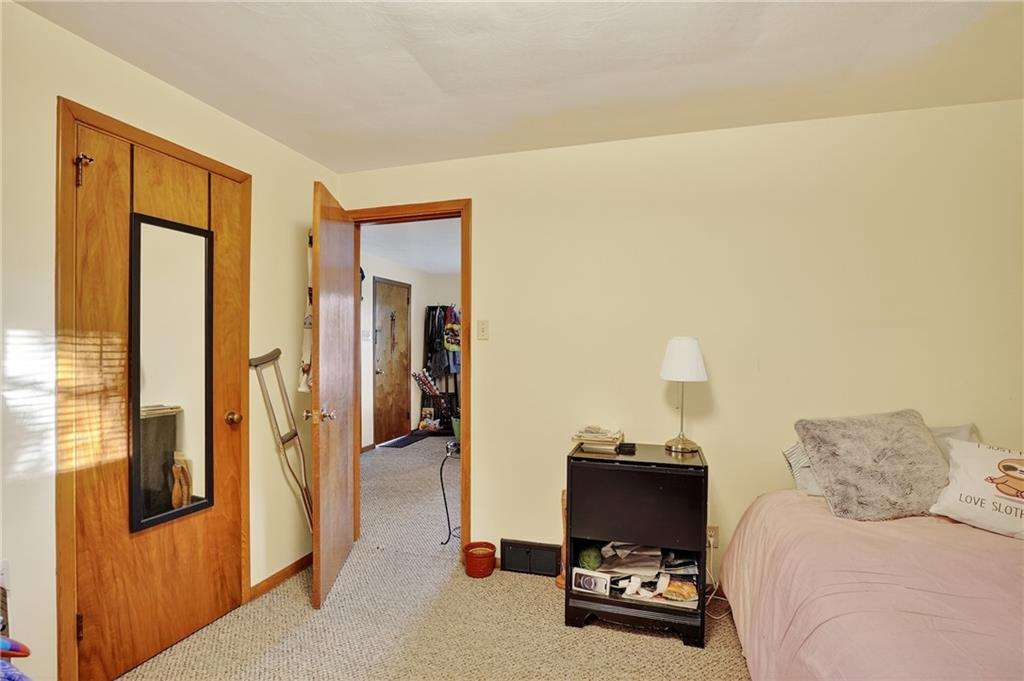 718 West Ingomar Road Pittsburgh, PA 15237 - Photo 19 of 40 a bedroom with furniture and a window