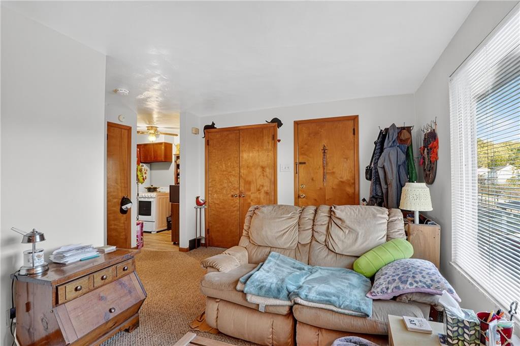 718 West Ingomar Road Pittsburgh, PA 15237 - Photo 24 of 40 a living room with furniture and a window