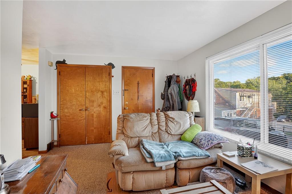 718 West Ingomar Road Pittsburgh, PA 15237 - Photo 25 of 40 a living room with furniture and a window