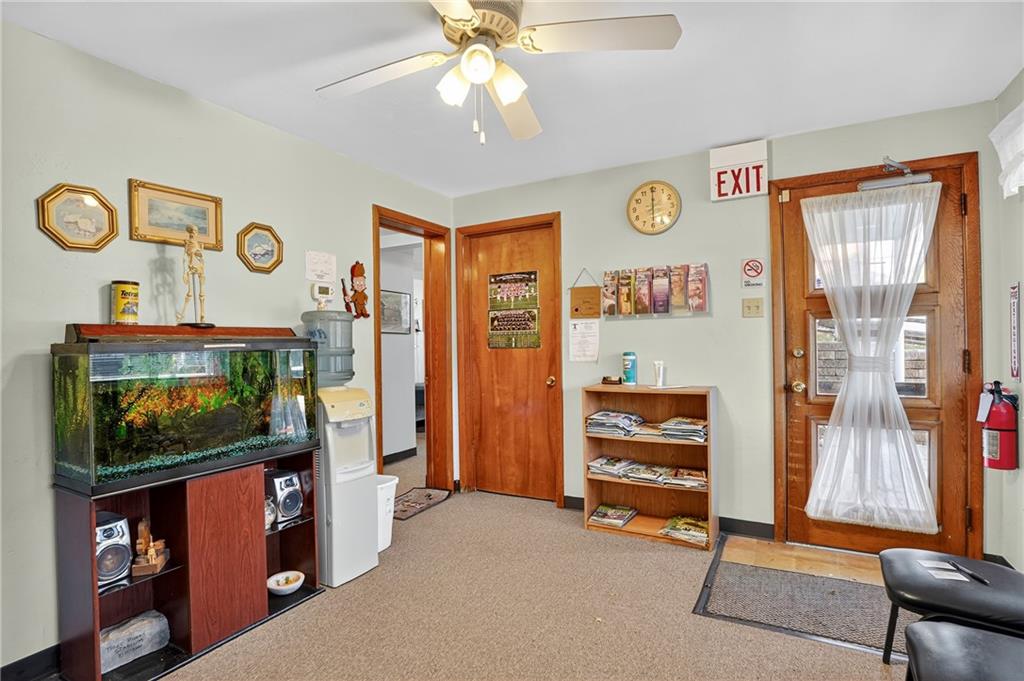 718 West Ingomar Road Pittsburgh, PA 15237 - Photo 30 of 40 a living room with furniture and a flat screen tv