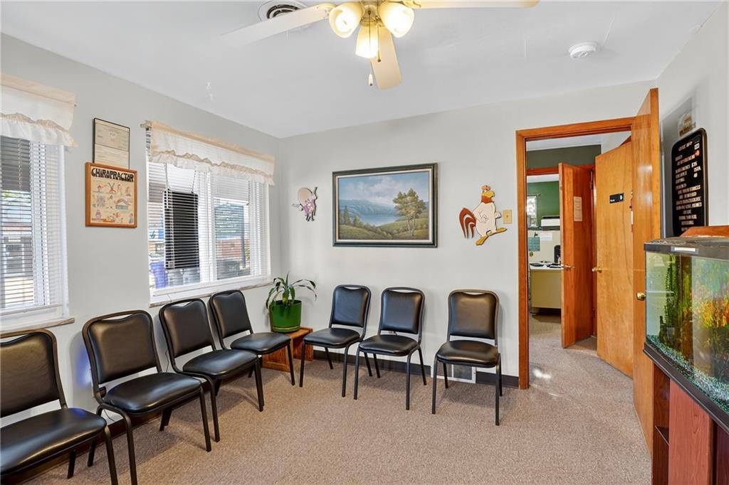 718 West Ingomar Road Pittsburgh, PA 15237 - Photo 39 of 40 a living room with furniture and a potted plant