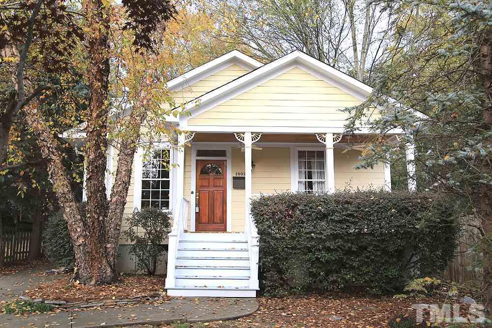 1802 Reaves Drive Raleigh, NC 27608 - Photo 21 of 22 a front view of a house with a garden