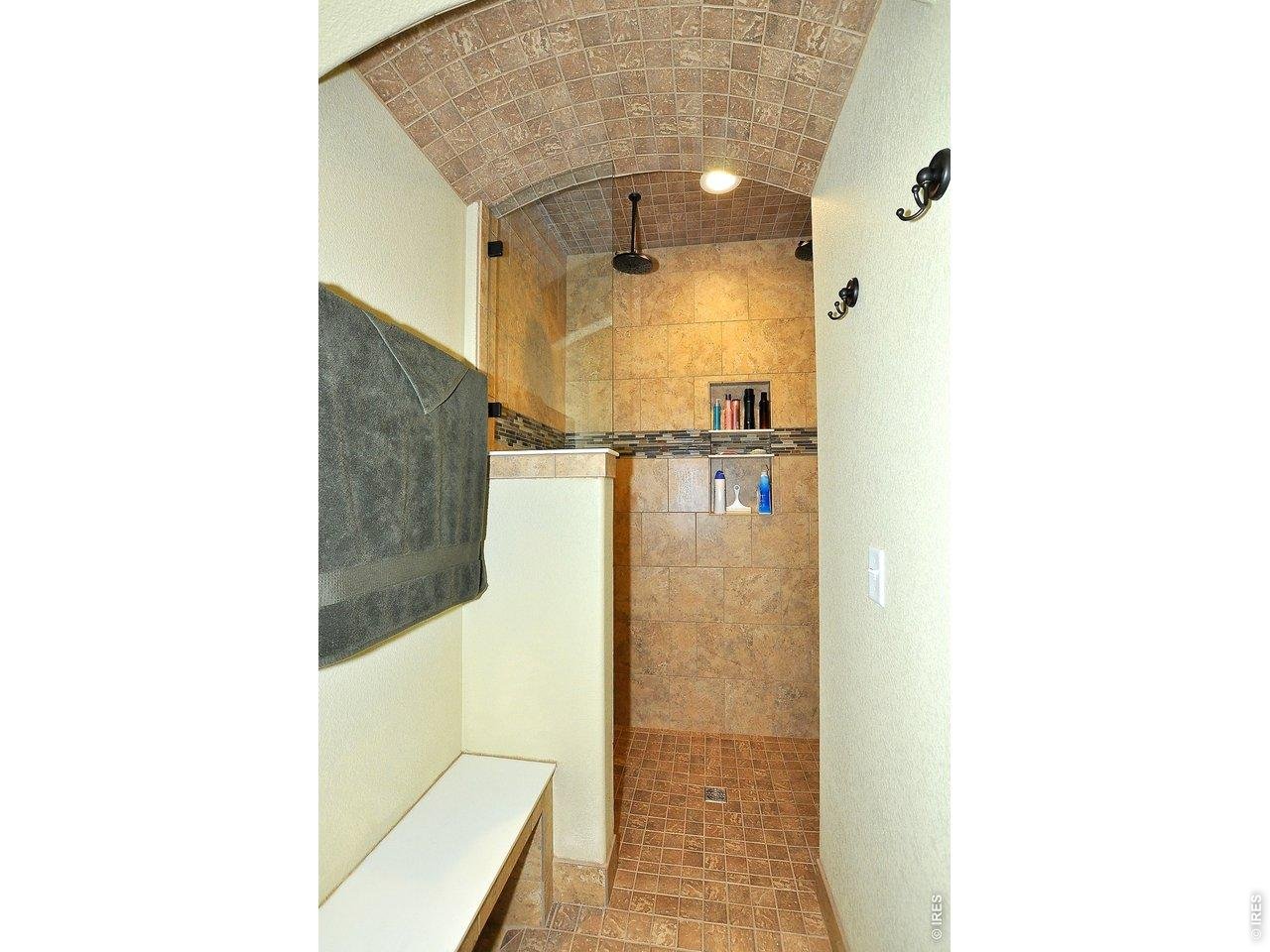 6201 West 13th St Road Greeley, CO 80634 - Photo 24 of 50 His'n Her Rain Heads in curbless shower with vaulted entry