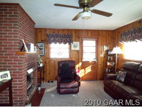 2747 Lyndhurst Road Waynesboro, VA 22980 - Photo 5 of 8 a living room with furniture and a fireplace