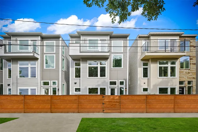 front view of a building with a yard