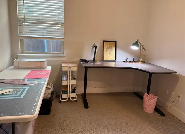 a room with a table and chairs