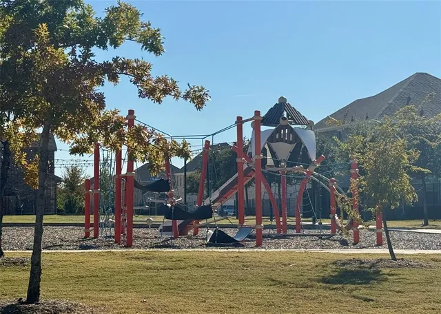 a view of a lake with a building in the background