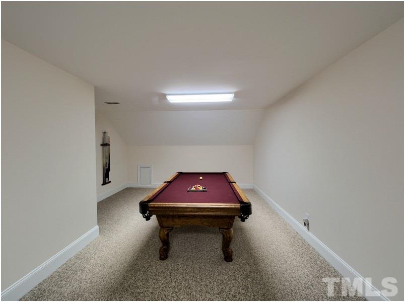9012 Carrington Ridge Drive Raleigh, NC 27615 - Photo 21 of 22 a room with pool table and table