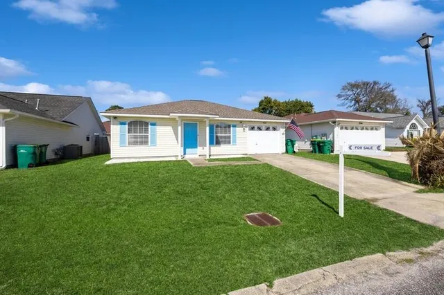 a house view with a garden space