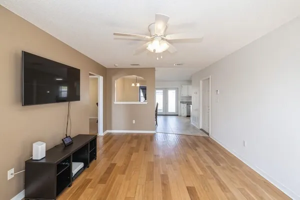 a view of a kitchen from the hallway