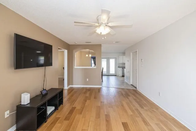 a view of a kitchen from the hallway