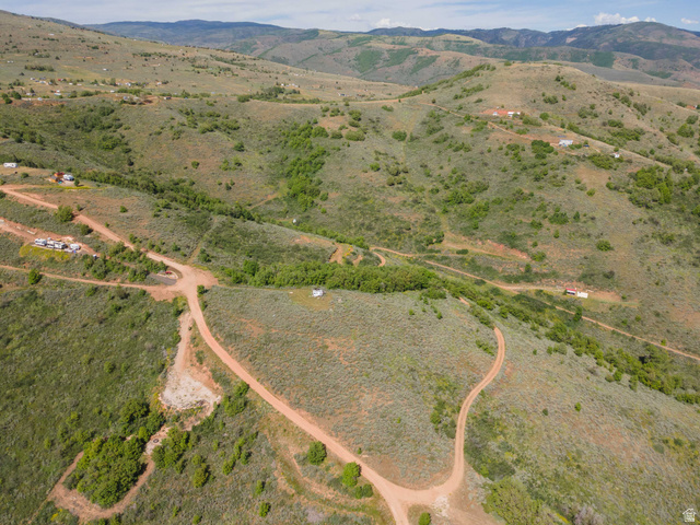 73 North River View Road, Unit 73 Huntsville, UT 84317 - Photo 18 of 21 Expansive undeveloped land featuring rolling hills, scattered green foliage, and natural terrain