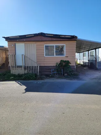 front view of a house with a street