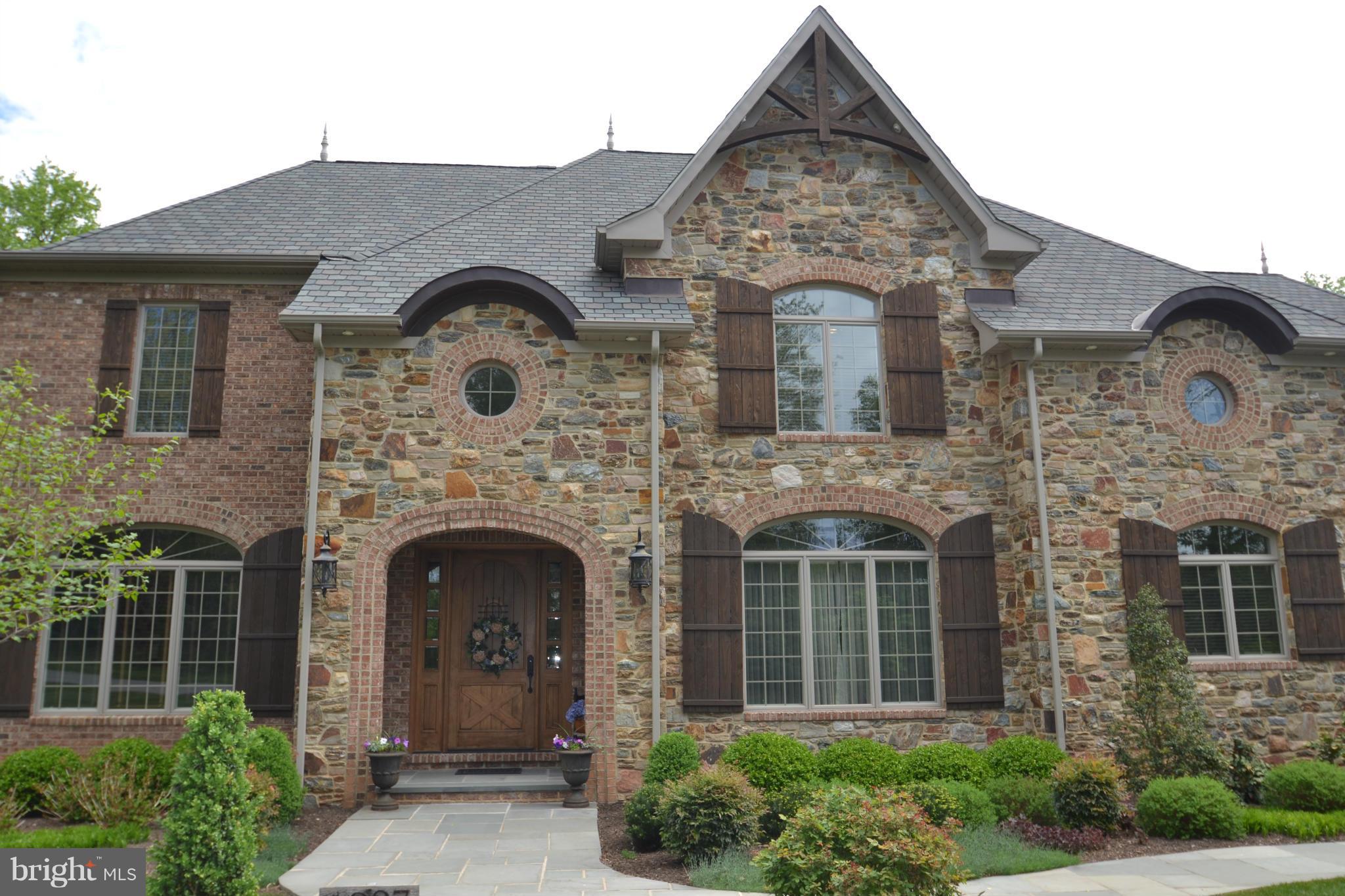 1827 Ridge Road Reisterstown, MD 21136 - Photo 2 of 30 front view of a house with a garden