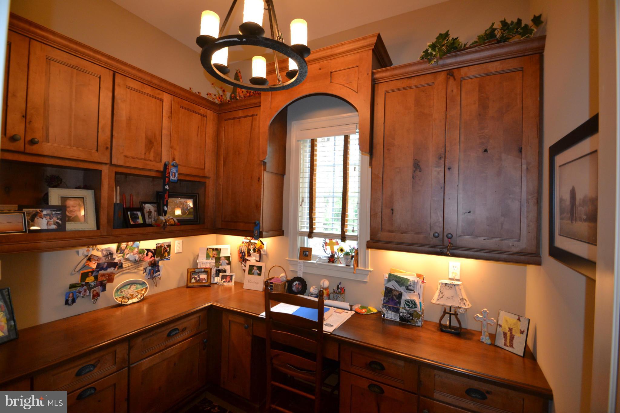 1827 Ridge Road Reisterstown, MD 21136 - Photo 14 of 30 a bathroom with a sink a mirror and cabinets