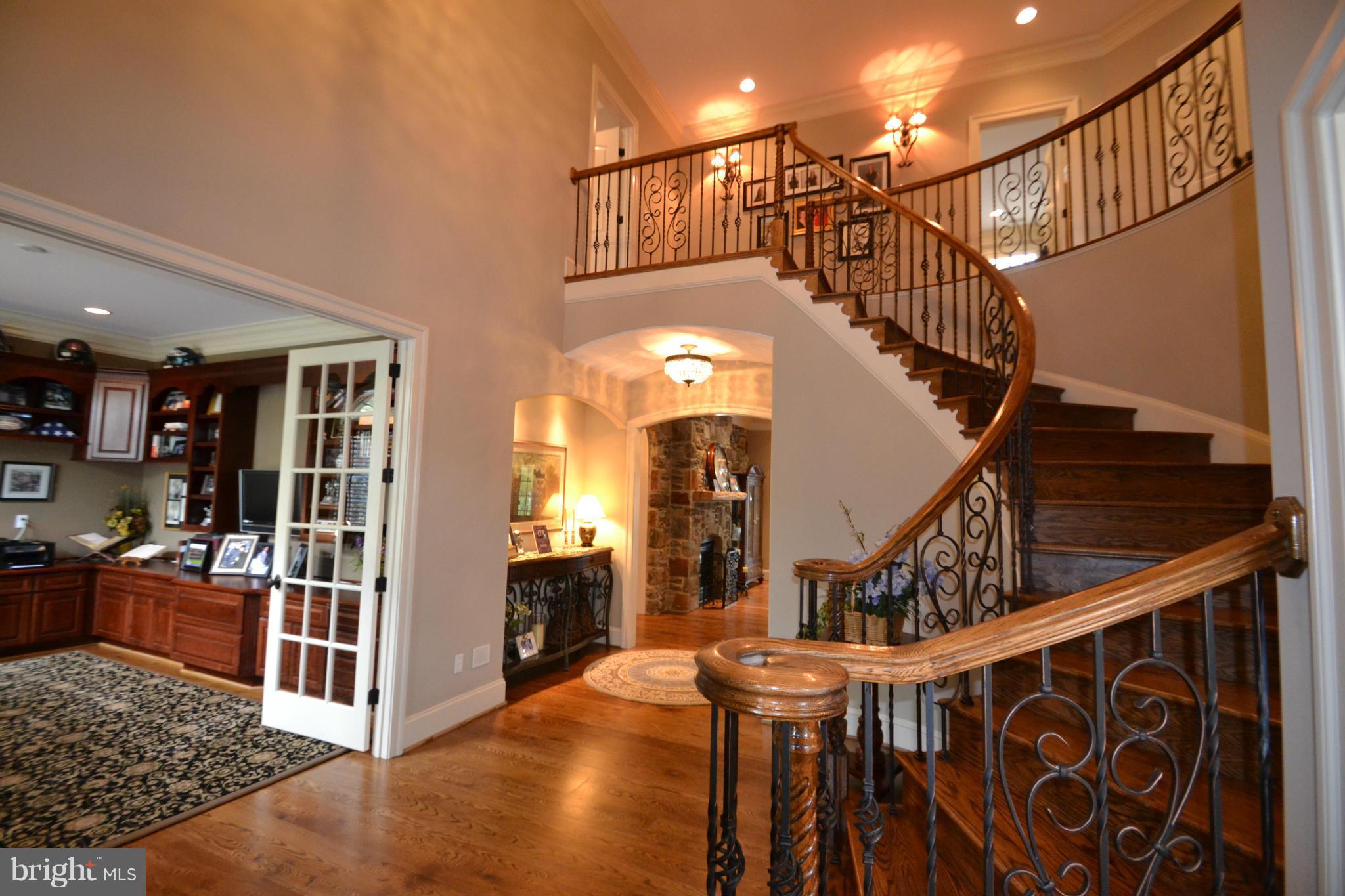1827 Ridge Road Reisterstown, MD 21136 - Photo 3 of 30 a view of entryway and hall with wooden floor