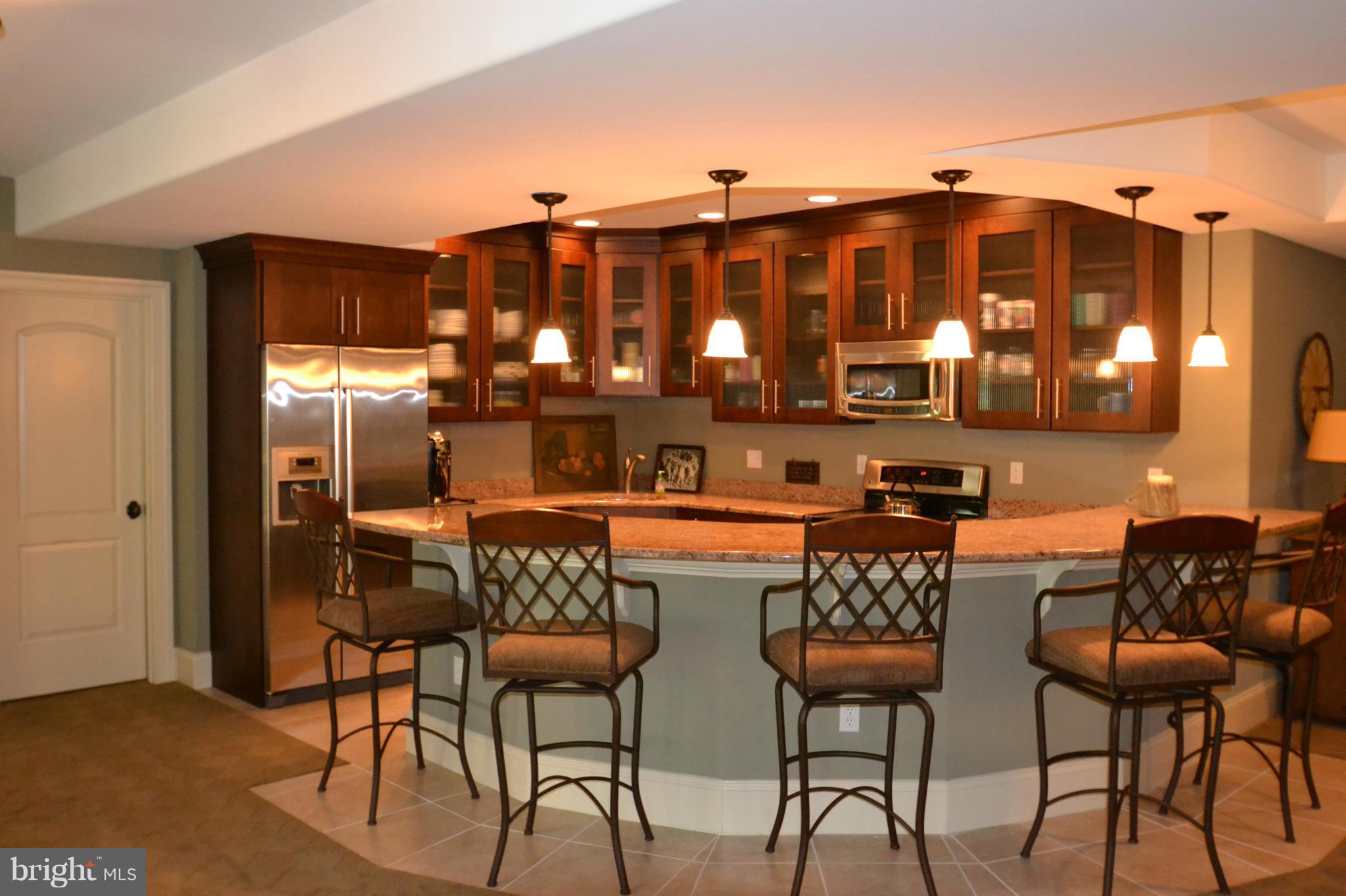 1827 Ridge Road Reisterstown, MD 21136 - Photo 22 of 30 a view of a chairs and tables in the patio