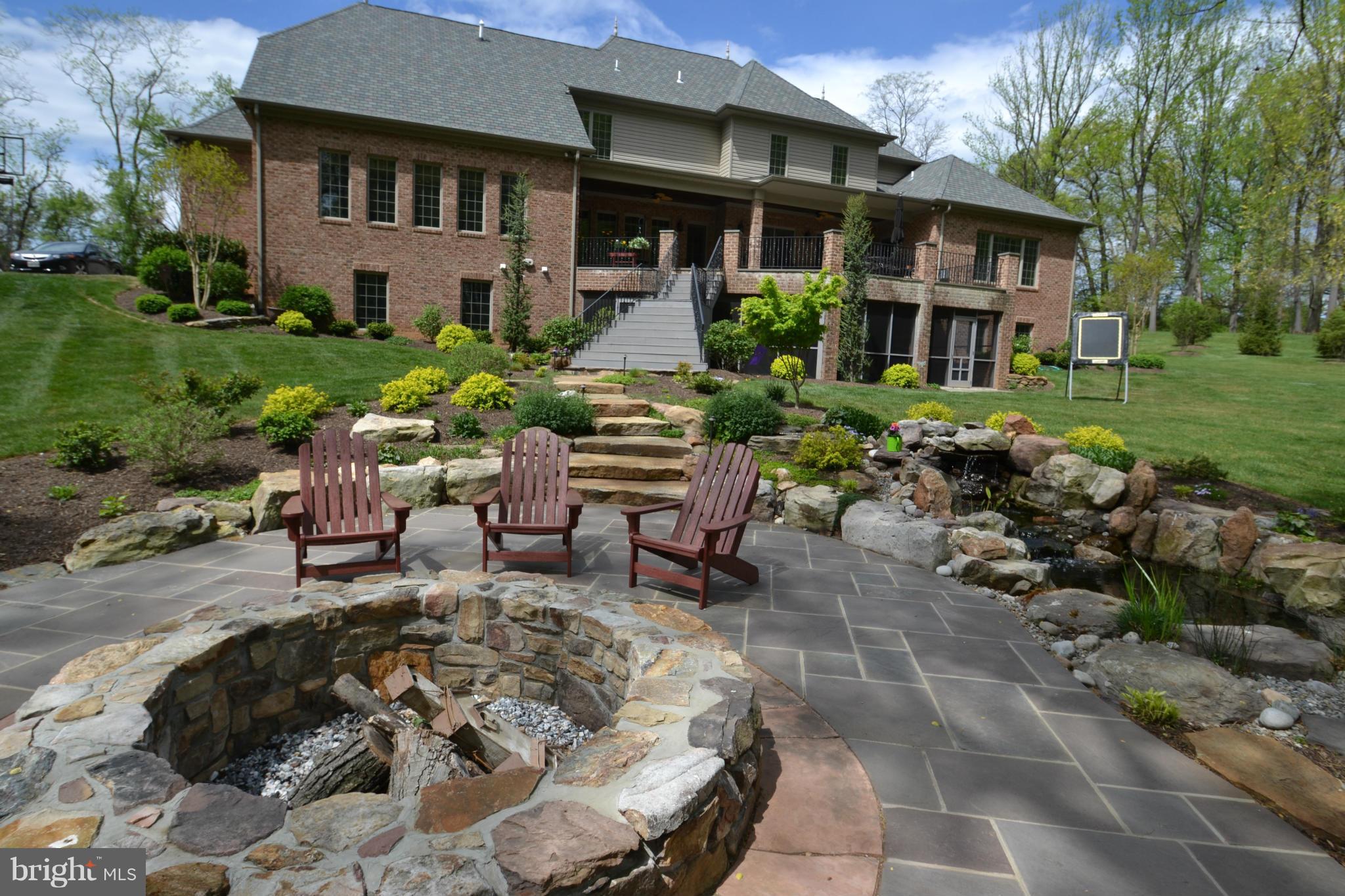 1827 Ridge Road Reisterstown, MD 21136 - Photo 27 of 30 a view of a chairs and table in backyard of the house