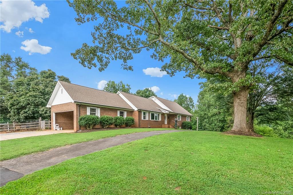 1914 Coxe Road Rutherfordton, NC 28139 - Photo 2 of 47 a front view of a house with a yard