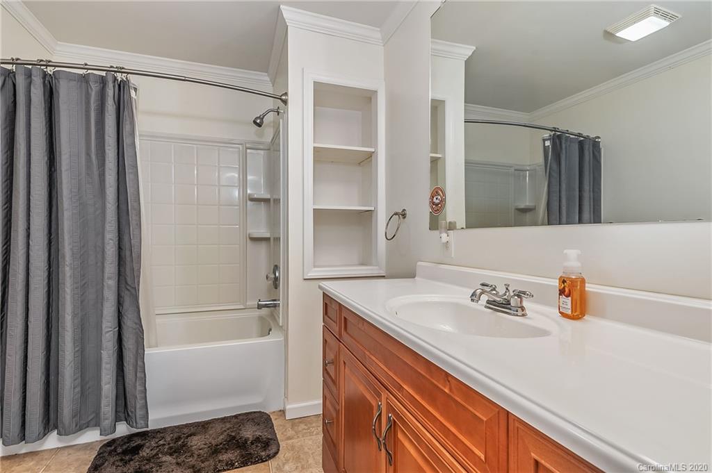 1914 Coxe Road Rutherfordton, NC 28139 - Photo 23 of 47 a bathroom with a sink and a mirror