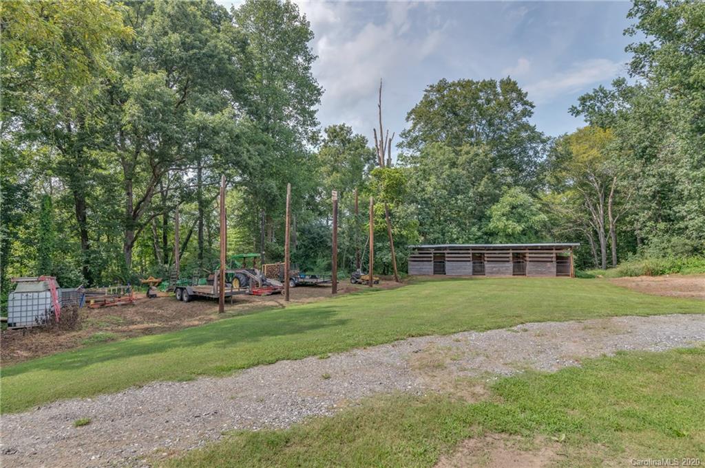 1914 Coxe Road Rutherfordton, NC 28139 - Photo 46 of 47 a front view of a house with garden