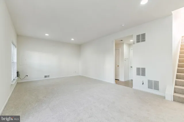 an empty room with a natural light