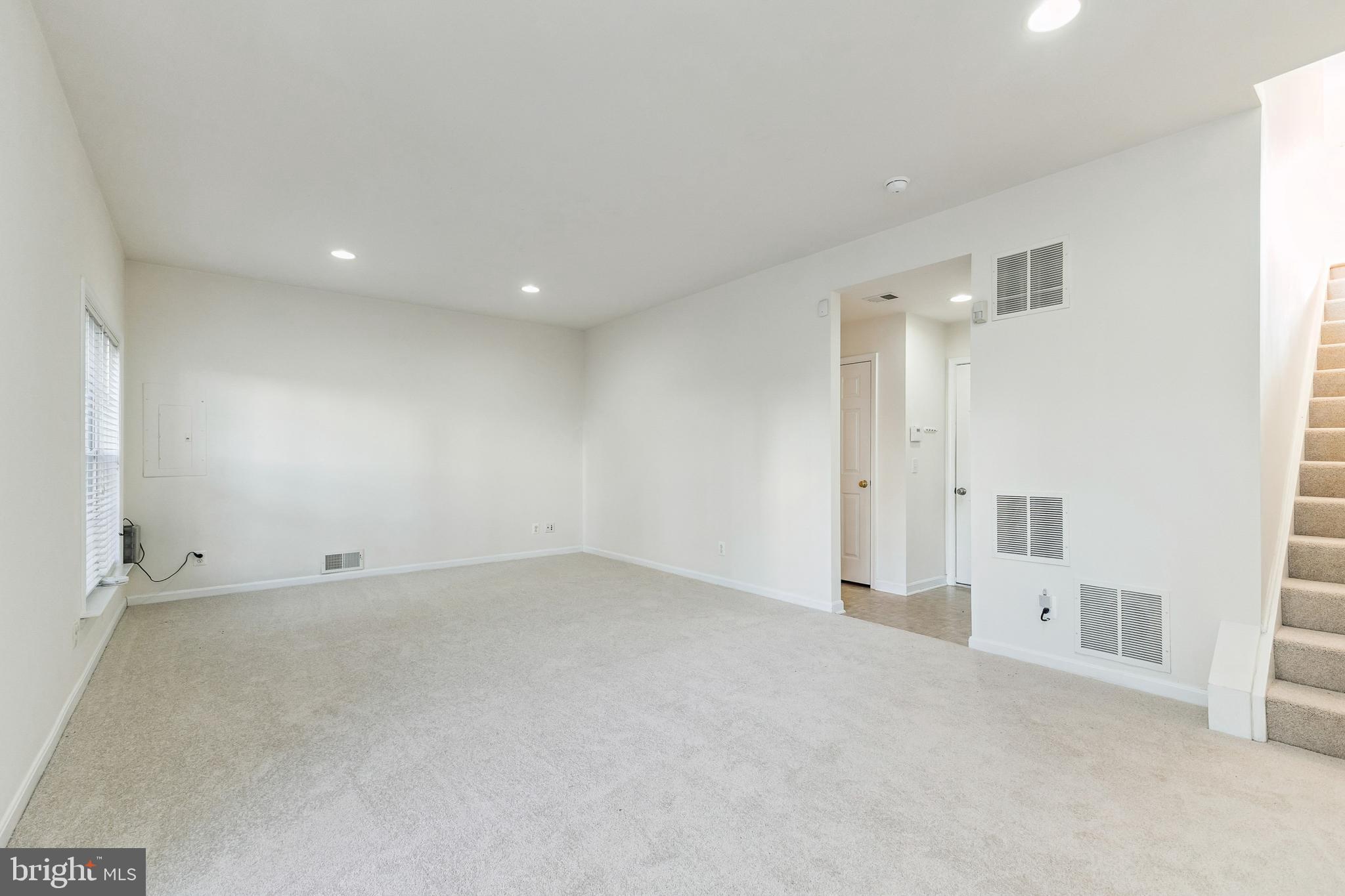 13083 Rose Petal Circle Herndon, VA 20171 - Photo 12 of 29 an empty room with a natural light