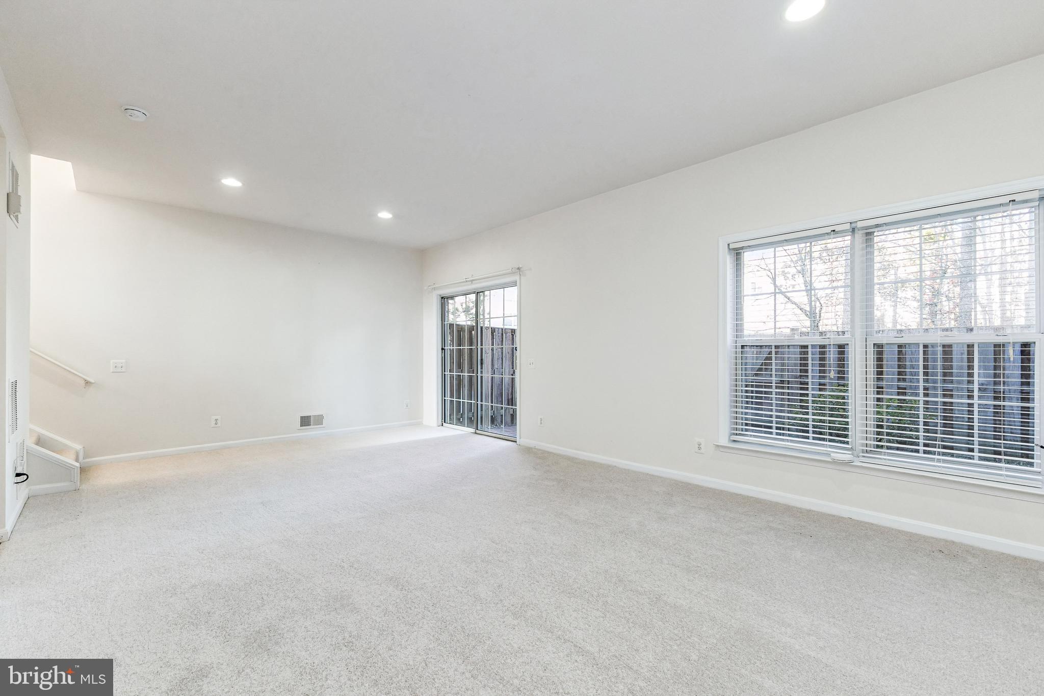 13083 Rose Petal Circle Herndon, VA 20171 - Photo 13 of 29 a view of an empty room with a window