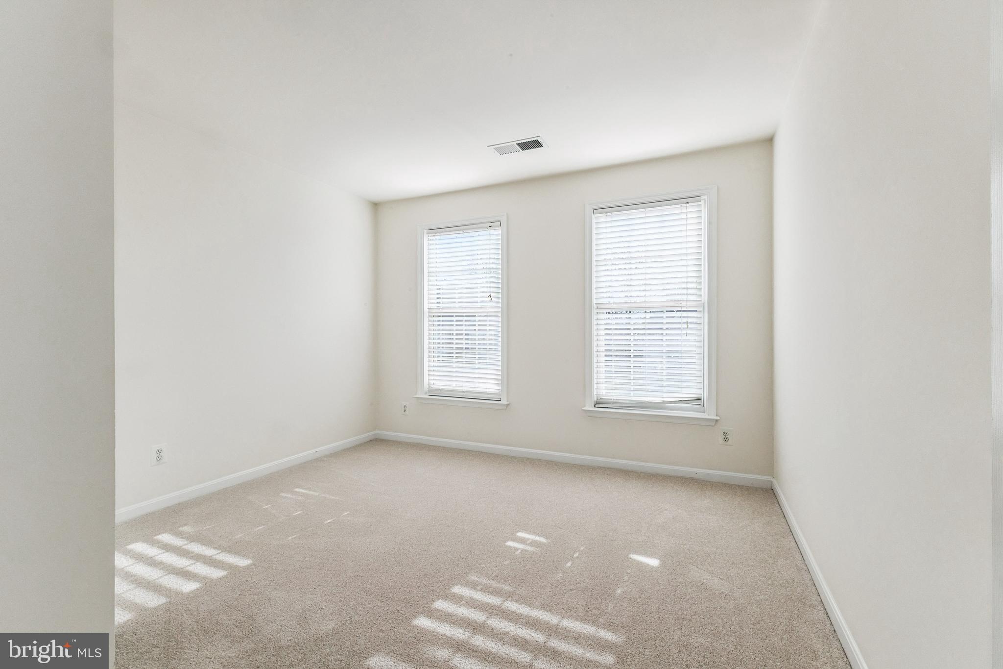 13083 Rose Petal Circle Herndon, VA 20171 - Photo 16 of 29 an empty room with a window