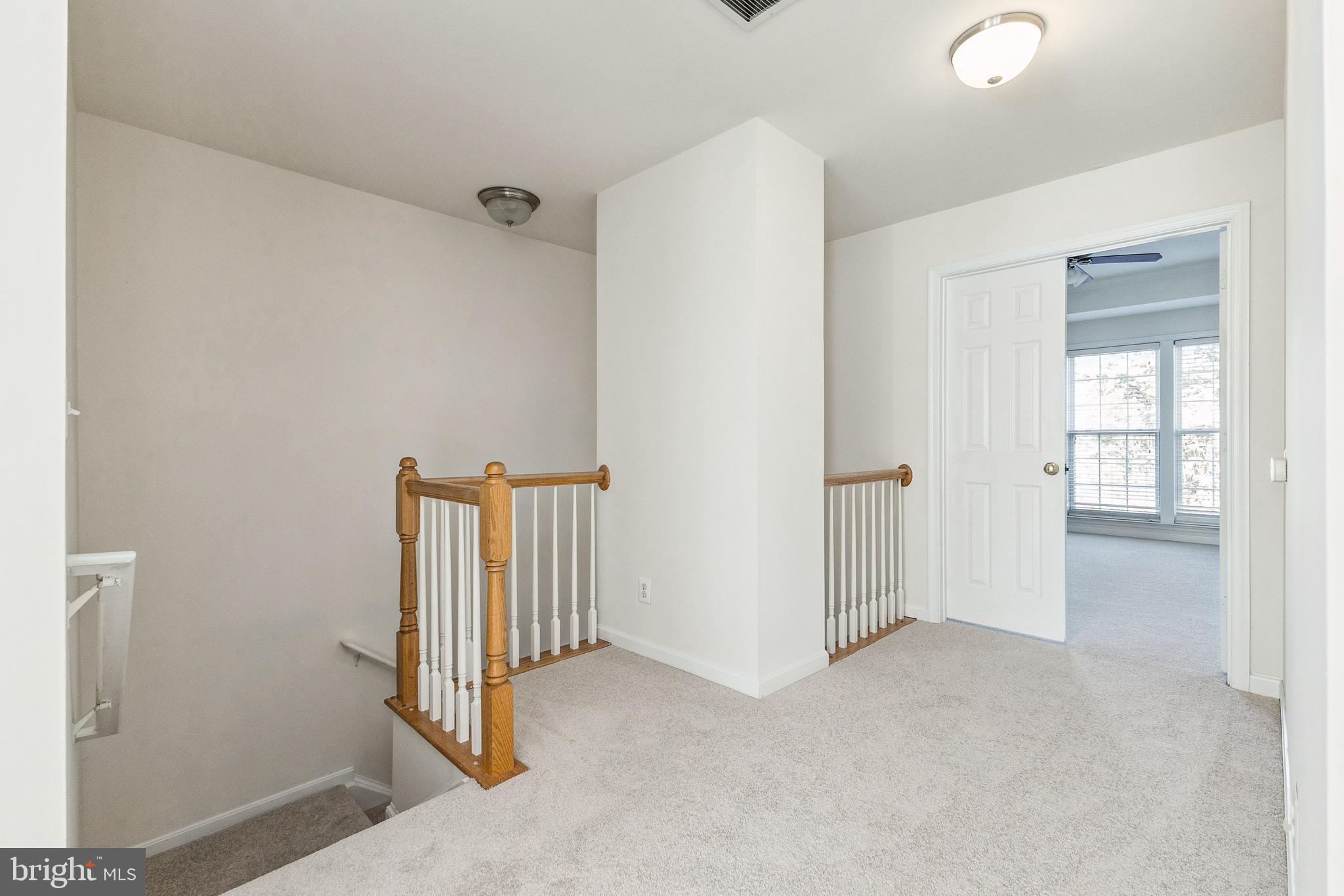 13083 Rose Petal Circle Herndon, VA 20171 - Photo 18 of 29 a view of a livingroom with entryway
