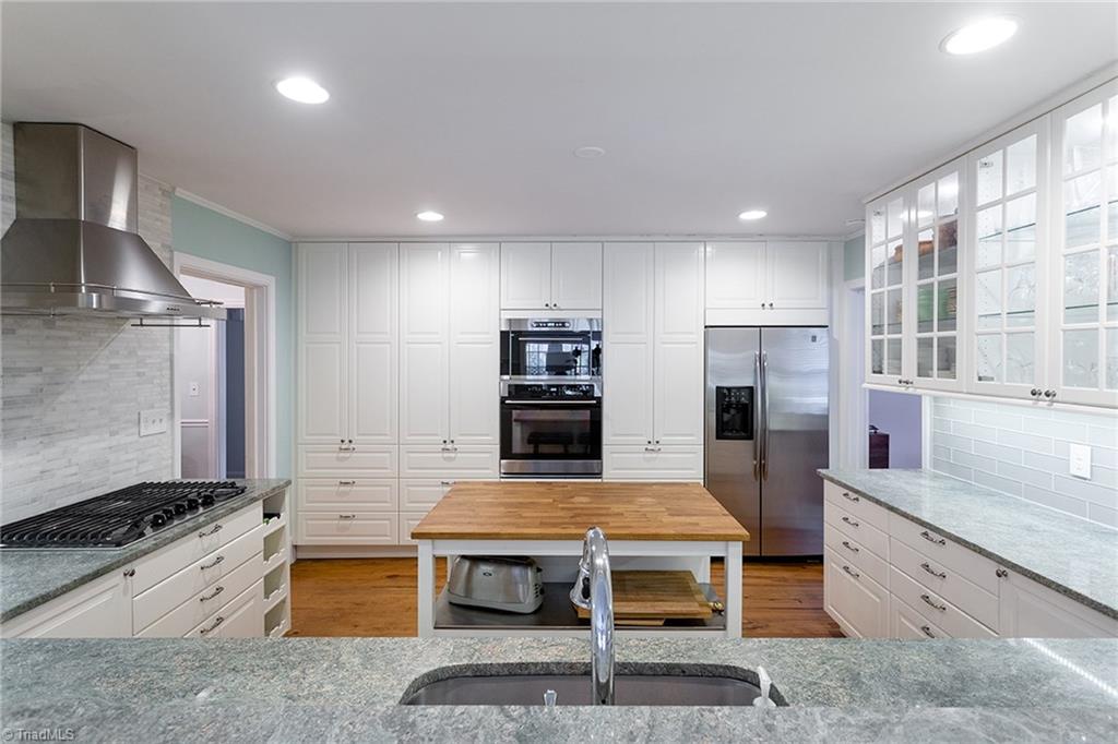 2741 Spring Garden Road Winston-Salem, NC 27106 - Photo 14 of 30 Kitchen viewed from sunroom/den