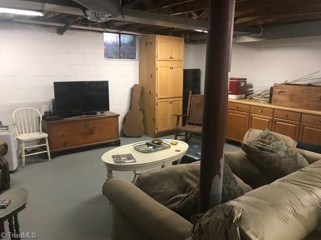 2741 Spring Garden Road Winston-Salem, NC 27106 - Photo 29 of 30 Huge man cave/workshop area in unfinished area of basement