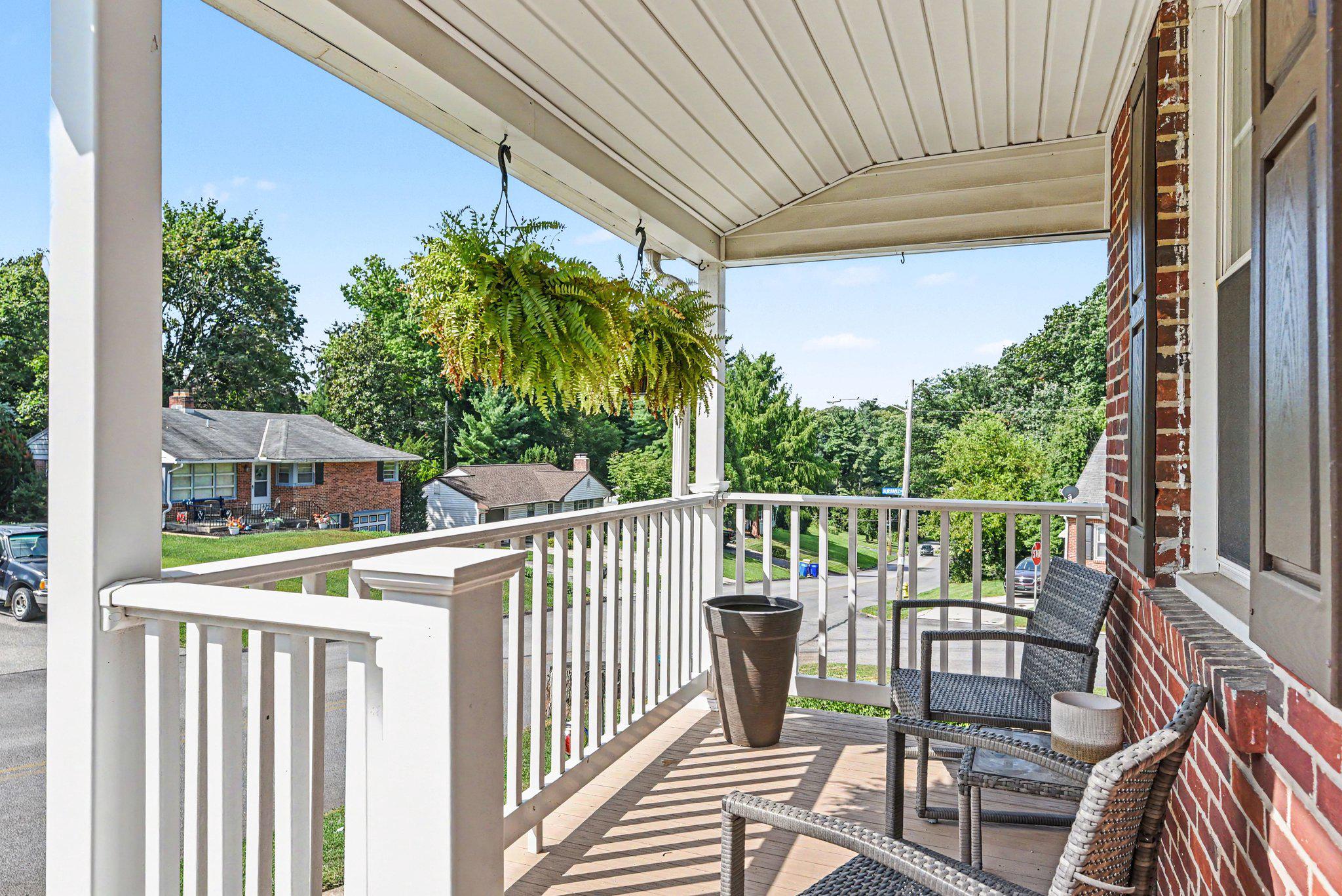 603 Rathton Road York, PA 17403 - Photo 3 of 30 Charming porch with lush greenery.