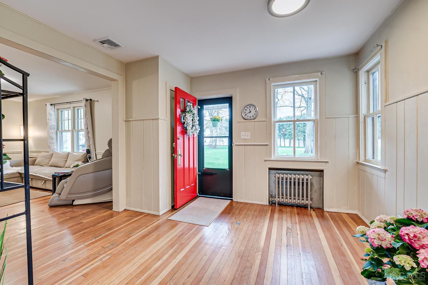 13 Herron Road Edison, NJ 08820 - Photo 17 of 51 wooden floor in an empty room with a window