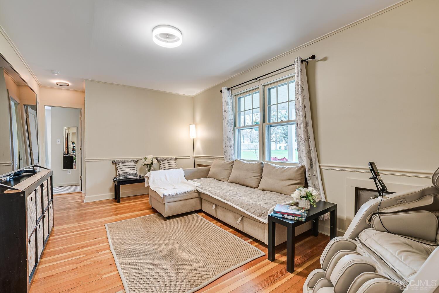 13 Herron Road Edison, NJ 08820 - Photo 19 of 51 a living room with furniture and a window