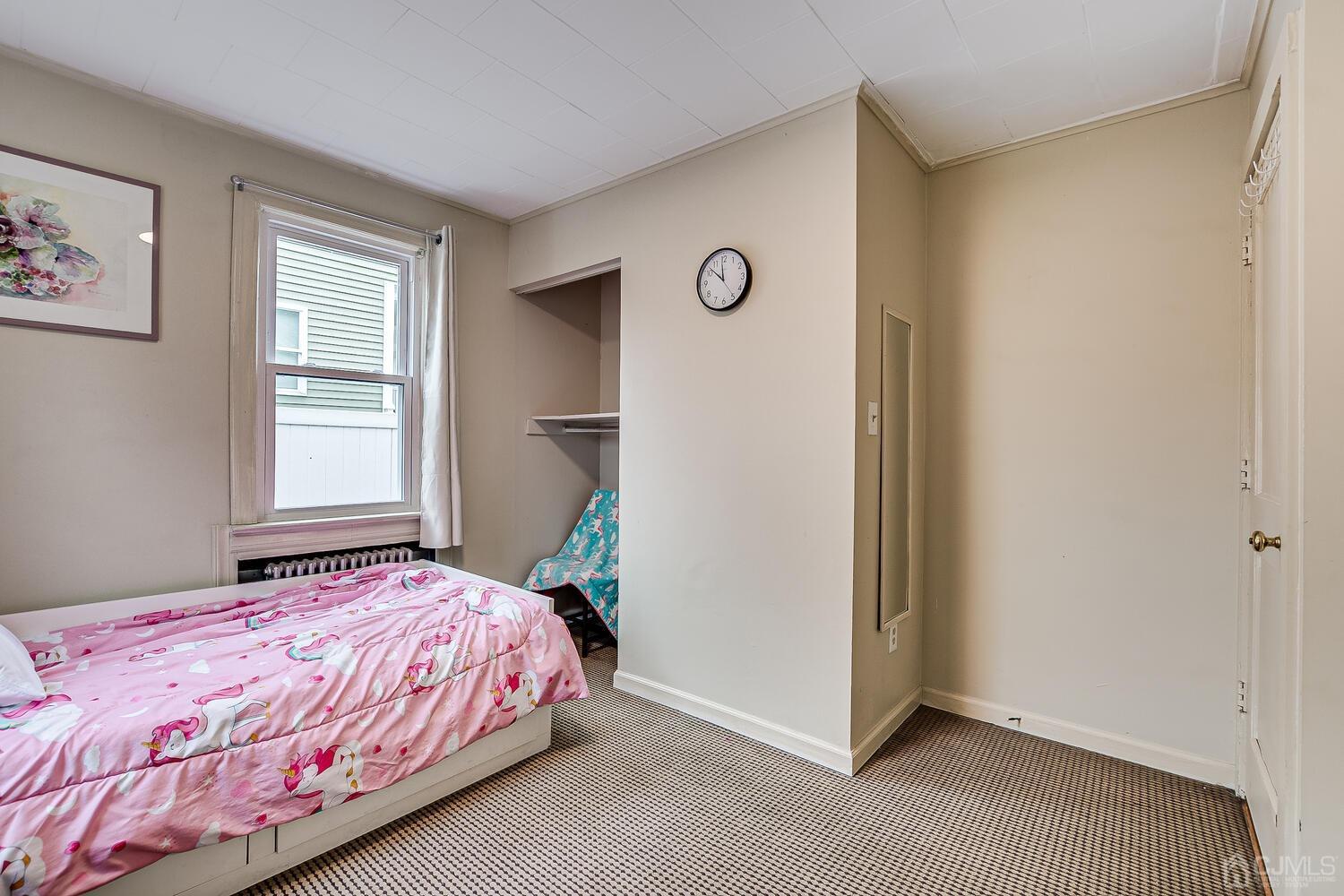 13 Herron Road Edison, NJ 08820 - Photo 32 of 51 a bedroom with a bed and a window