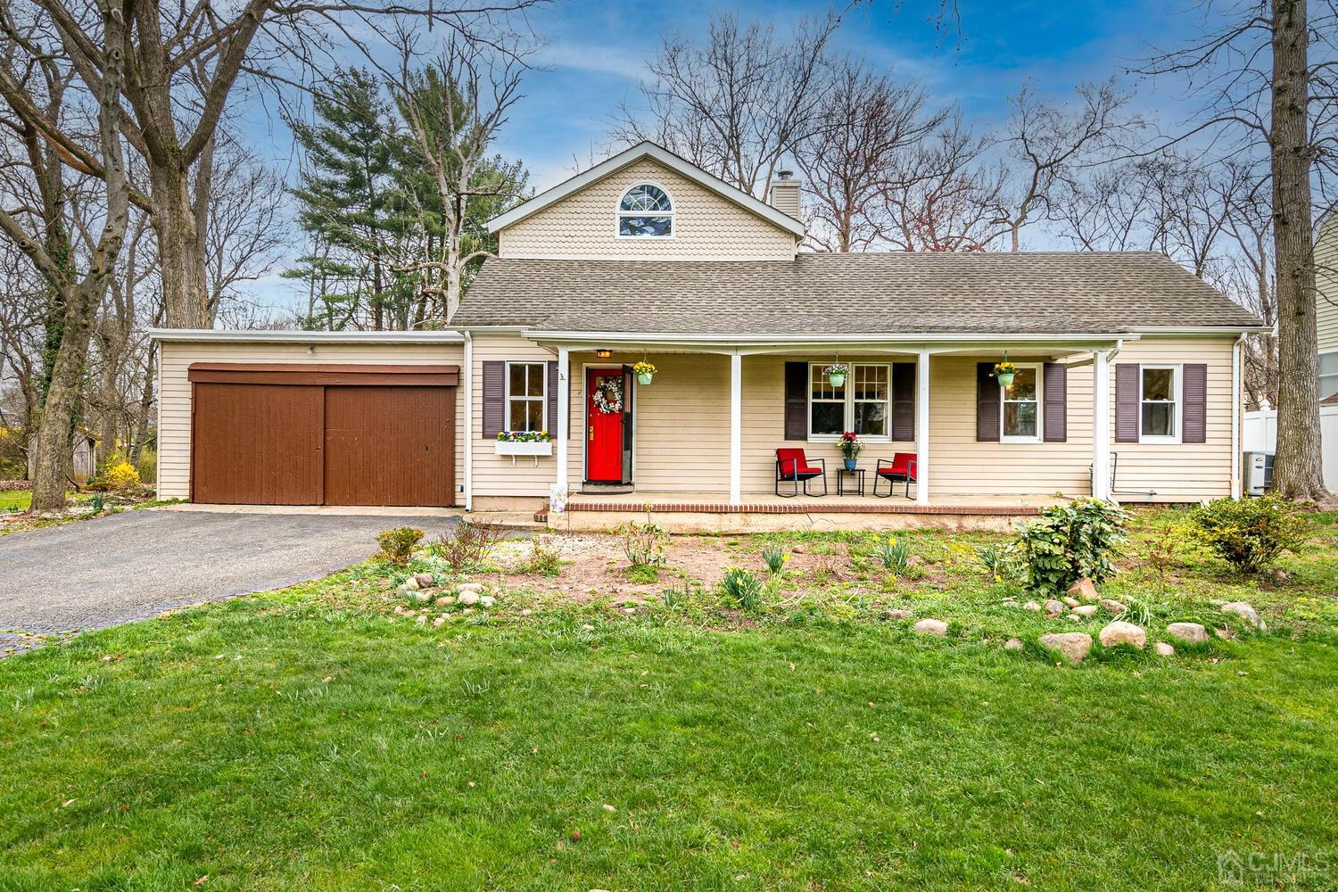 13 Herron Road Edison, NJ 08820 - Photo 4 of 51 front view of a house with a yard