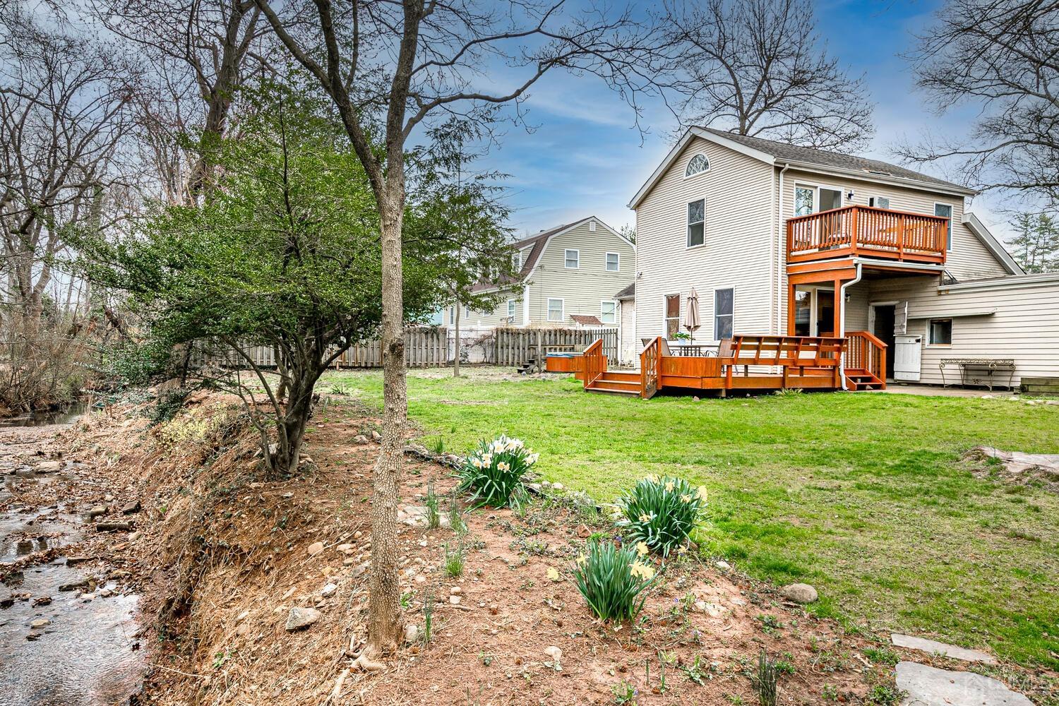 13 Herron Road Edison, NJ 08820 - Photo 45 of 51 a front view of a house with a yard table and chairs
