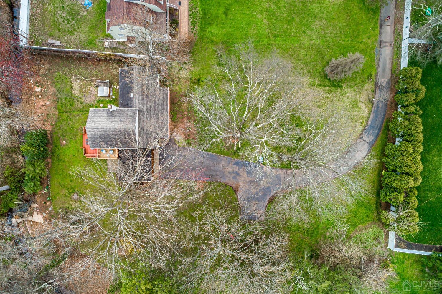13 Herron Road Edison, NJ 08820 - Photo 10 of 51 an aerial view of a house with a yard