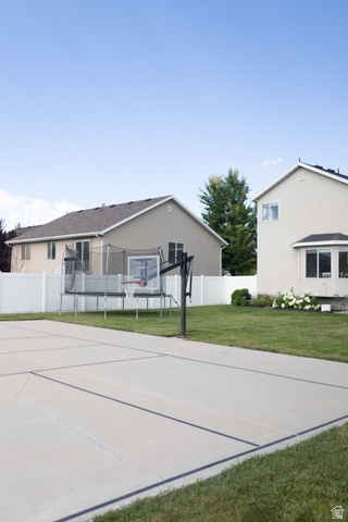 1204 North 3020th Street West Provo, UT 84601 - Photo 7 of 35 Sports court with painted lines and adjustable basketball hoop