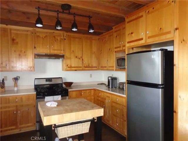 a living room with furniture and windows