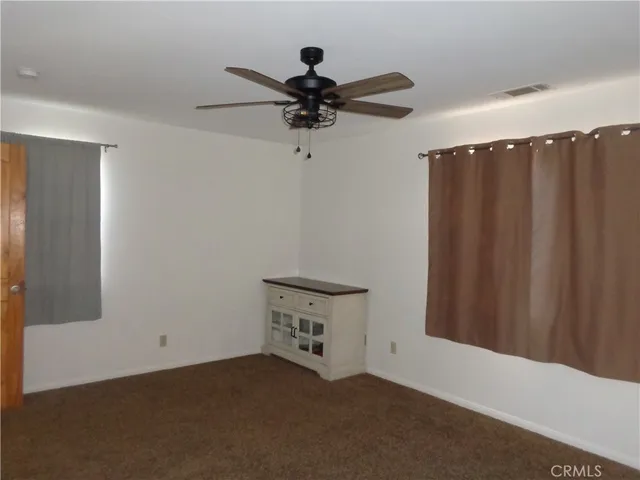 a bathroom with a sink a vanity and a mirror