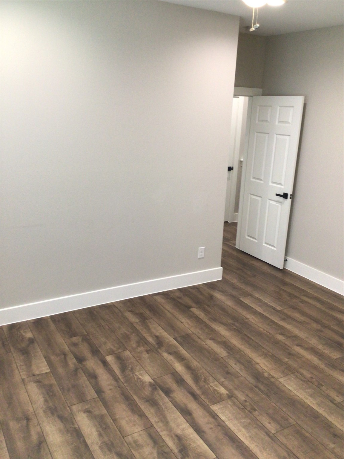 2109 Marnel Road, Unit F Houston, TX 77055 - Photo 12 of 29 a view of empty room with wooden floor