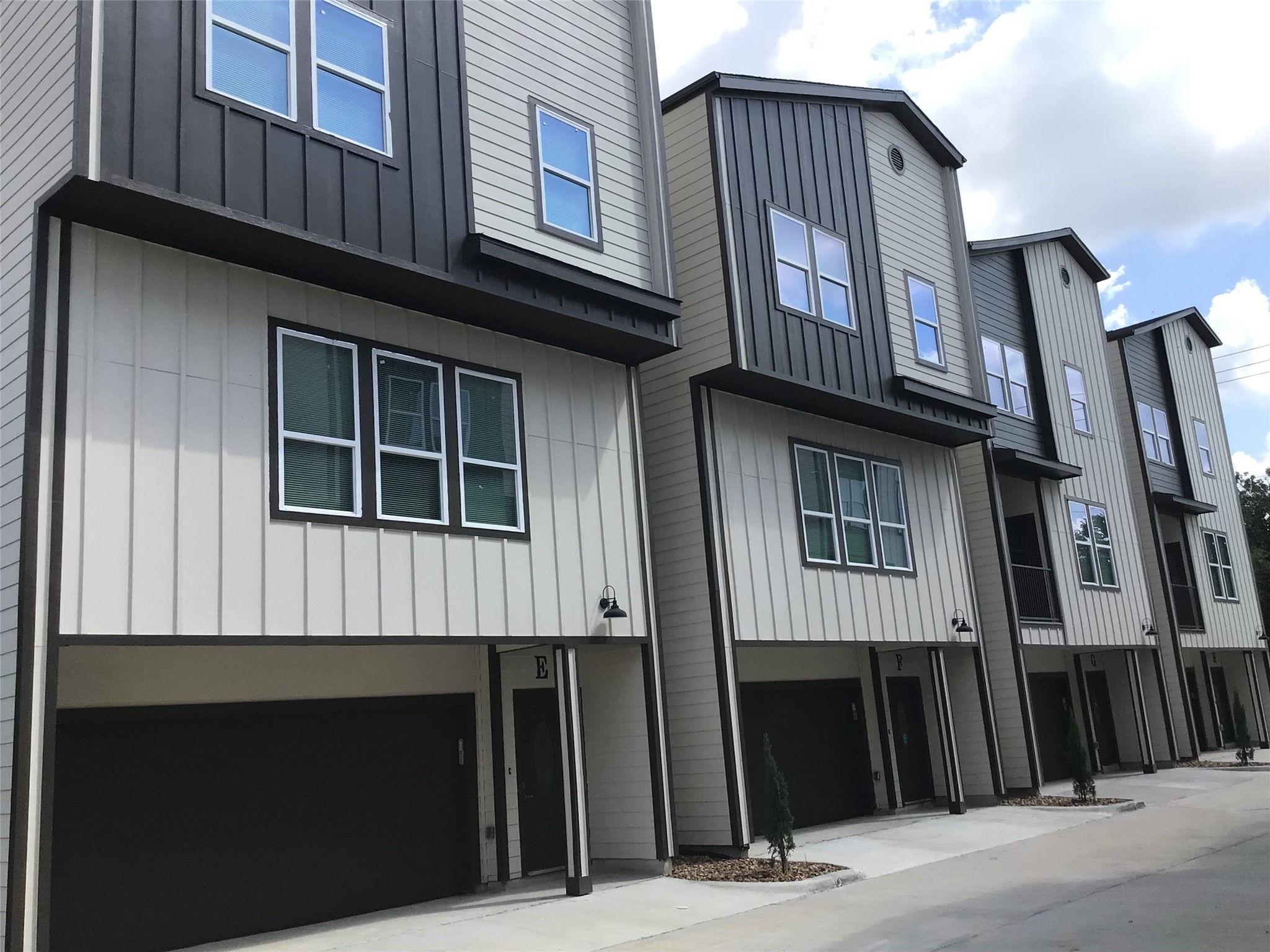 2109 Marnel Road, Unit F Houston, TX 77055 - Photo 2 of 29 a front view of residential houses